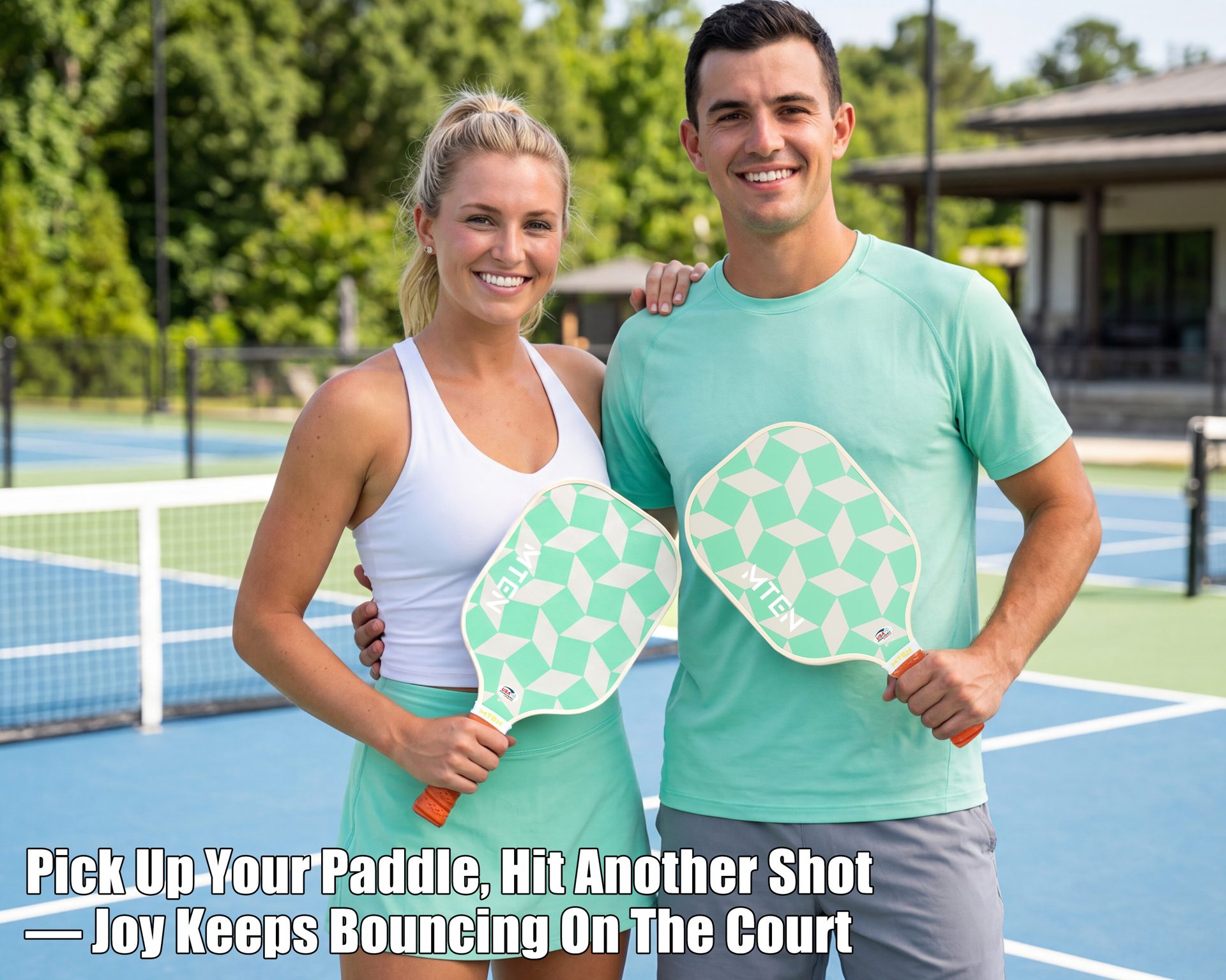 Two players holding MTEN mint checker pickleball paddles on a court