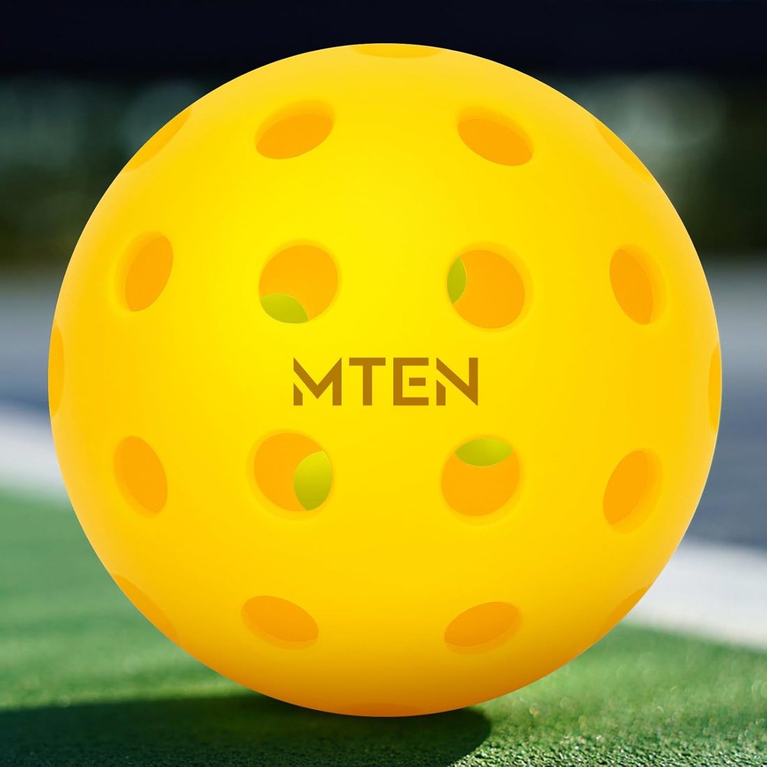MTEN yellow outdoor pickleballs 12 pack with 40 holes view 5